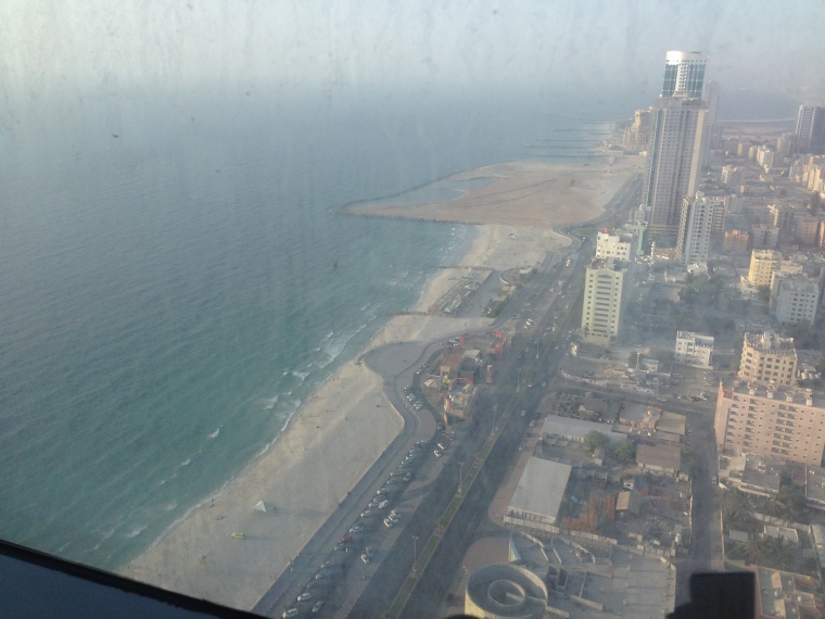 More than 40 floors up, the Gulf winks